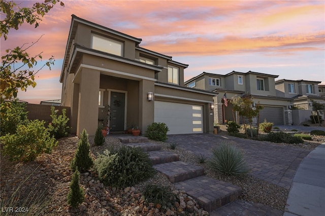 prairie-style home featuring a garage