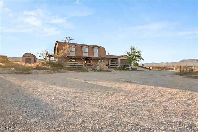 view of front of house featuring a mountain view