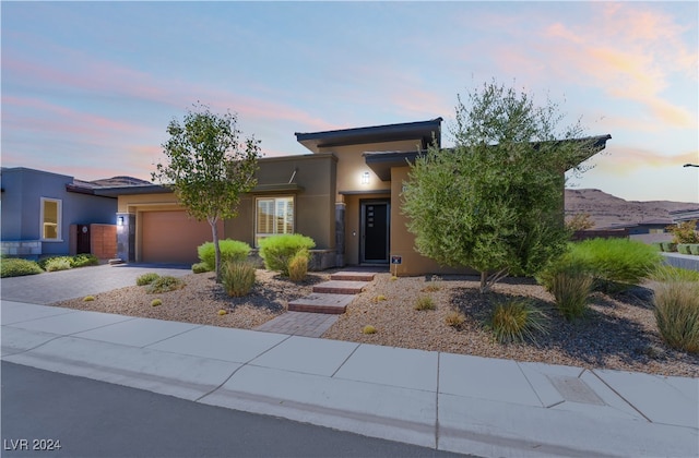 view of front of property featuring a garage