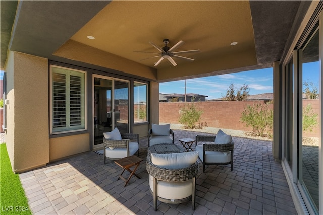 view of patio / terrace featuring ceiling fan