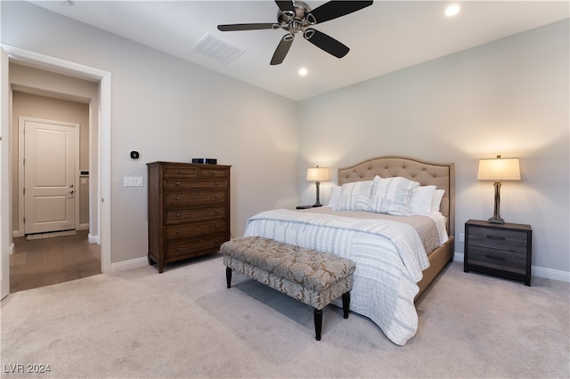 carpeted bedroom featuring ceiling fan