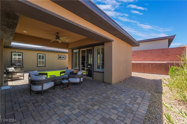 view of patio featuring outdoor lounge area and ceiling fan