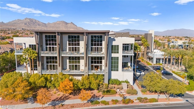 view of building exterior with a mountain view