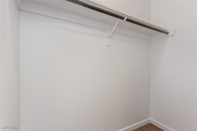 walk in closet featuring wood-type flooring