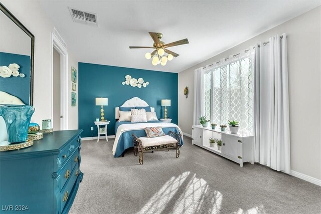 carpeted bedroom featuring ceiling fan