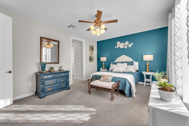 carpeted bedroom featuring ceiling fan