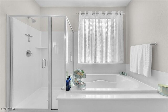 bathroom with plus walk in shower