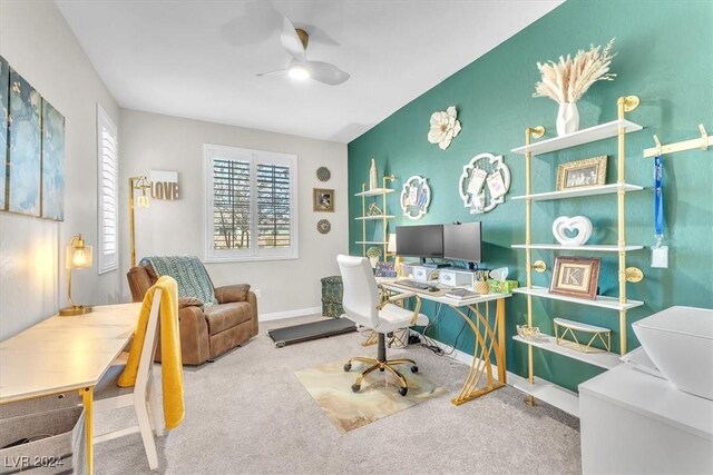 office space featuring ceiling fan and carpet