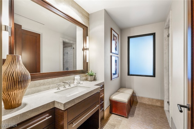 bathroom featuring tile patterned floors and vanity