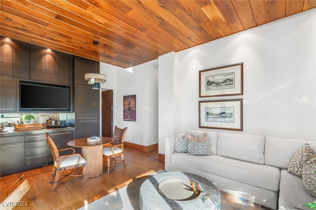 living room with hardwood / wood-style floors and wooden ceiling