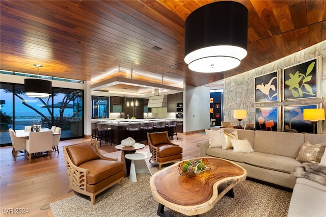 living room with light wood-type flooring and wood ceiling