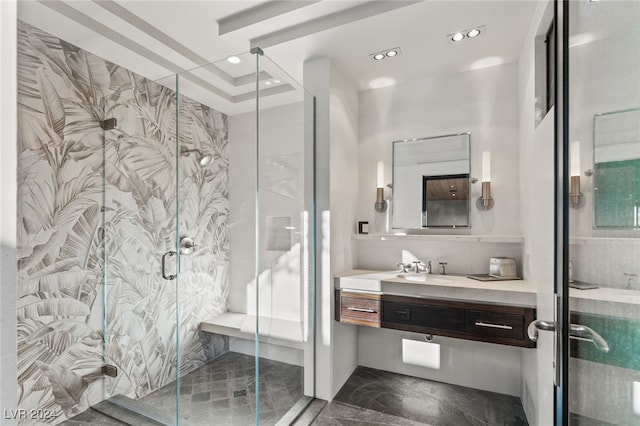 bathroom featuring vanity and walk in shower