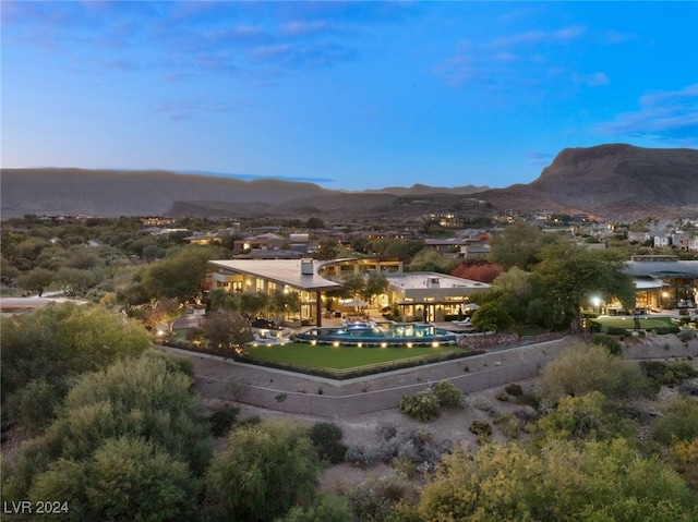 aerial view at dusk with a mountain view