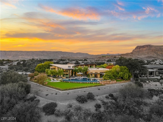 aerial view at dusk with a mountain view