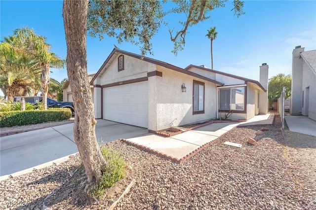 single story home with a garage