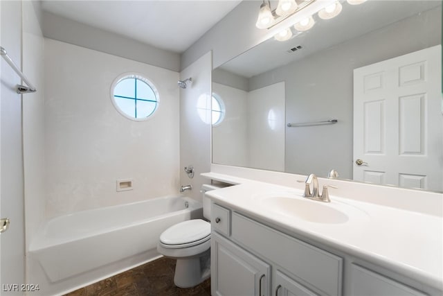 full bathroom with vanity,  shower combination, and toilet