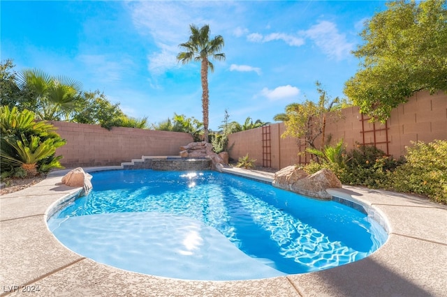 view of pool featuring pool water feature