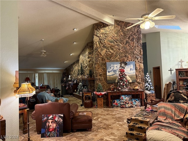 living room with ceiling fan, a fireplace, lofted ceiling with beams, and a textured ceiling