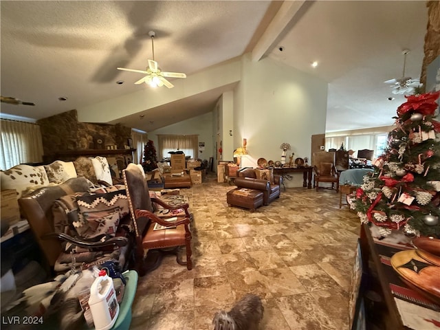 miscellaneous room featuring a textured ceiling, vaulted ceiling with beams, and ceiling fan