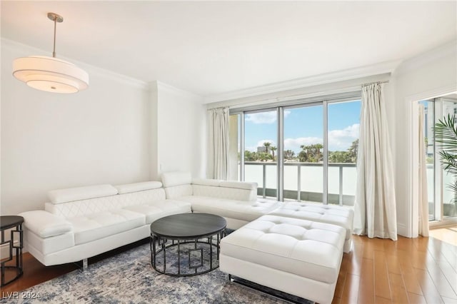 322 Karen Ave Unit 206, Las Vegas, NV 89109 - living room featuring wood finished floors, ornamental molding, and a water view