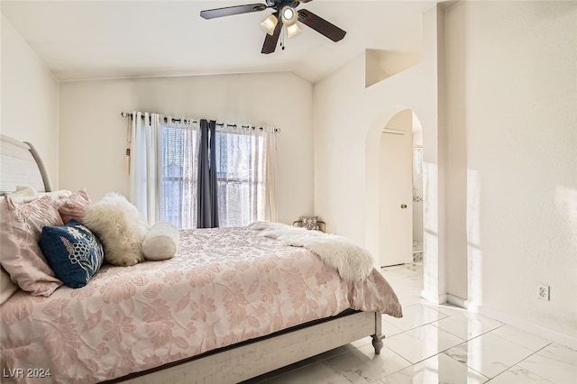 bedroom featuring vaulted ceiling and ceiling fan