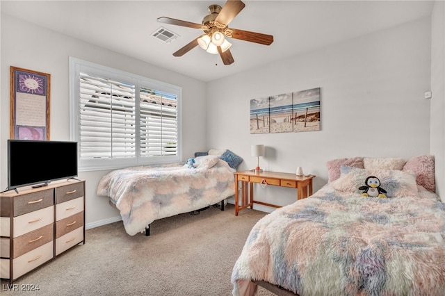 bedroom featuring ceiling fan and light colored carpet