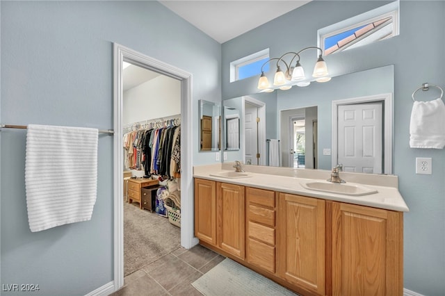 bathroom with vanity and tile patterned floors