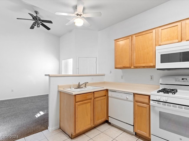 kitchen with white appliances, sink, ceiling fan, light tile patterned floors, and kitchen peninsula