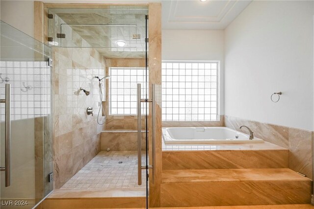 bathroom with independent shower and bath