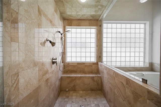 bathroom with a tile shower