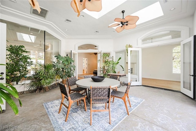 dining room featuring crown molding, french doors, and ceiling fan