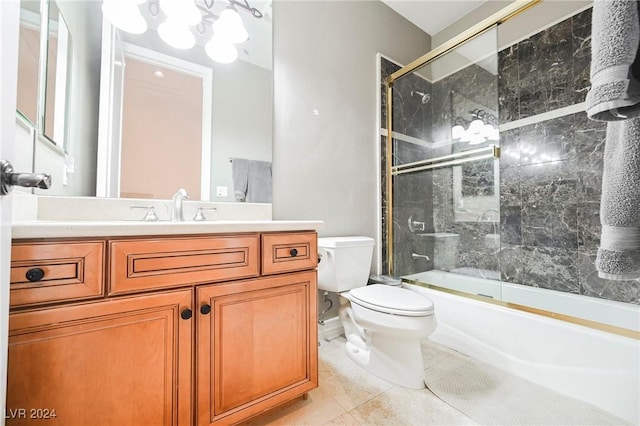 full bathroom featuring tile patterned flooring, vanity, enclosed tub / shower combo, and toilet