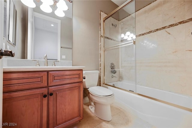 full bathroom featuring tile patterned flooring, enclosed tub / shower combo, vanity, and toilet