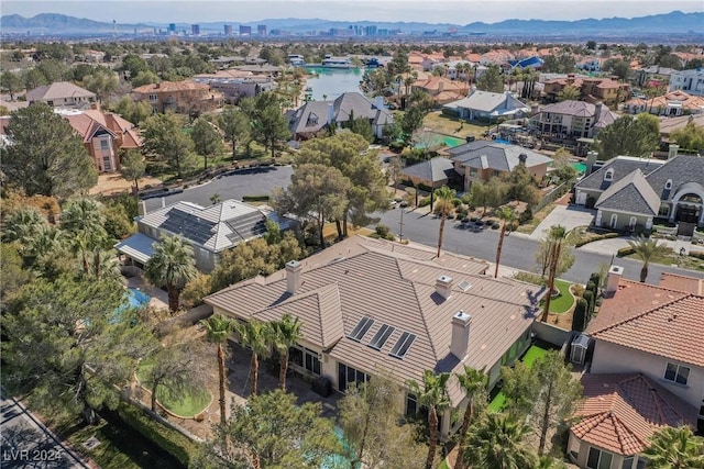 birds eye view of property featuring a mountain view