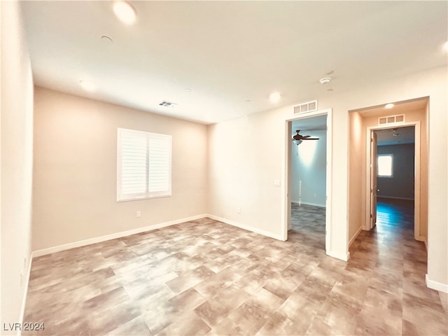 spare room featuring ceiling fan