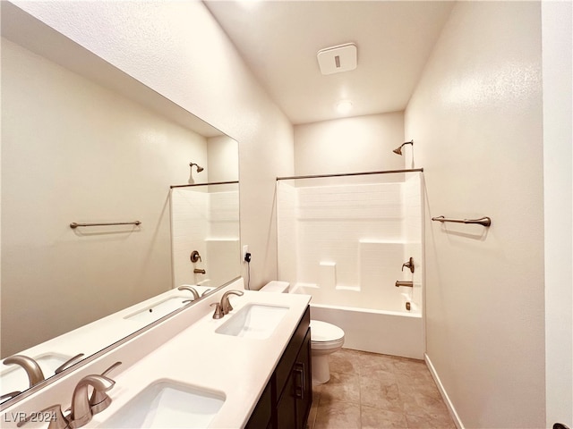 full bathroom with tile patterned floors, vanity,  shower combination, and toilet