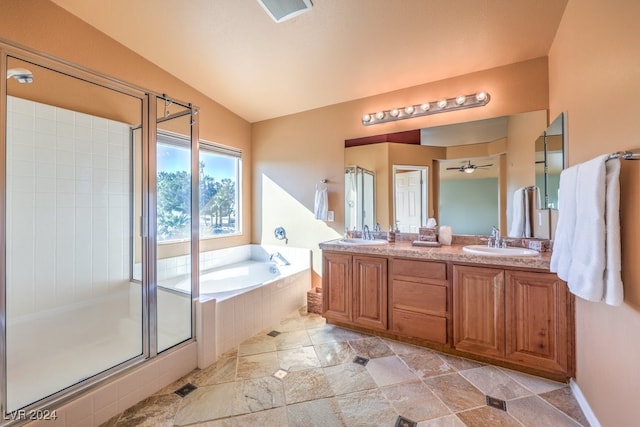 bathroom with vanity, ceiling fan, lofted ceiling, and plus walk in shower