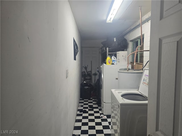 laundry room featuring washer and clothes dryer