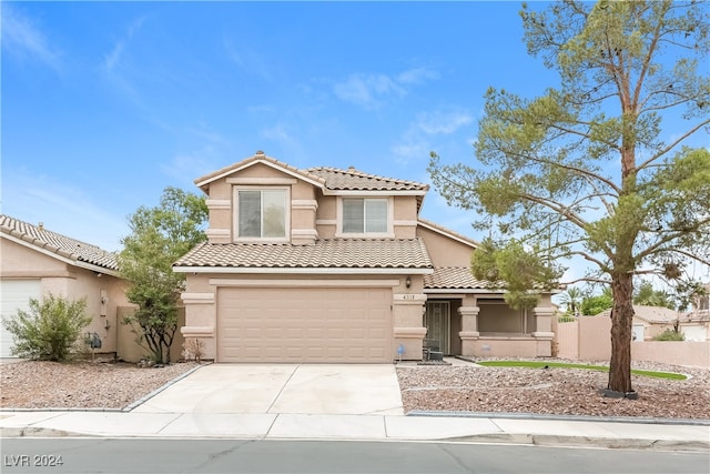 view of front of property featuring a garage