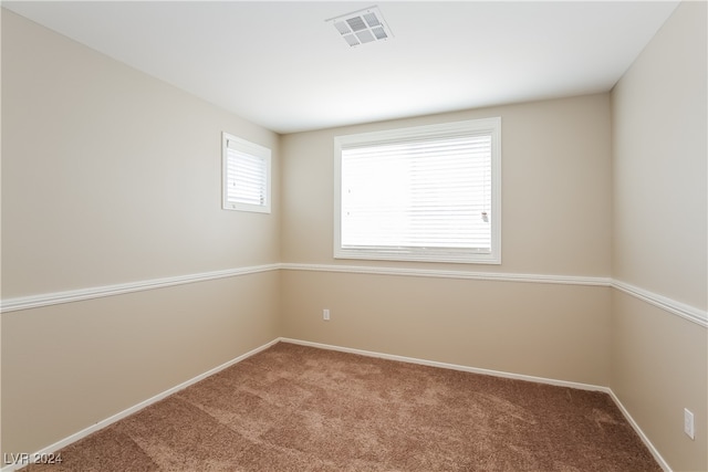 view of carpeted spare room