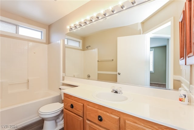 full bathroom with hardwood / wood-style flooring, vanity, toilet, and bathing tub / shower combination