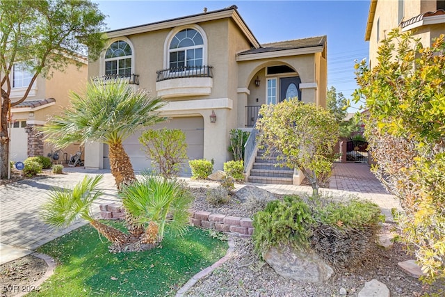 view of front of home with a garage