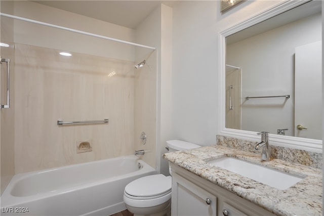 full bathroom featuring vanity, toilet, and tiled shower / bath