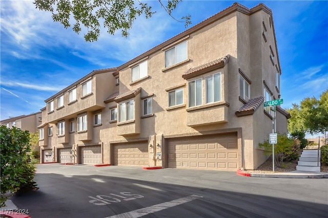 view of building exterior with a garage