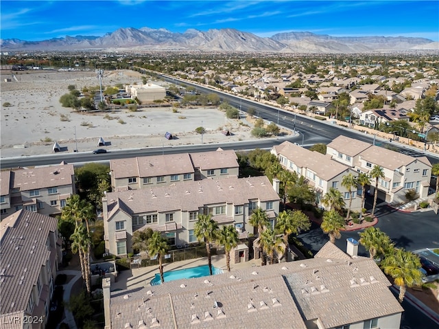 birds eye view of property featuring a mountain view