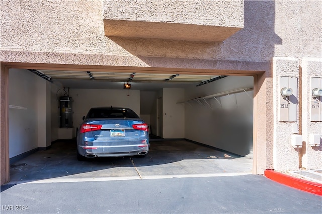 garage featuring strapped water heater