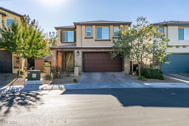 view of front of home with a garage