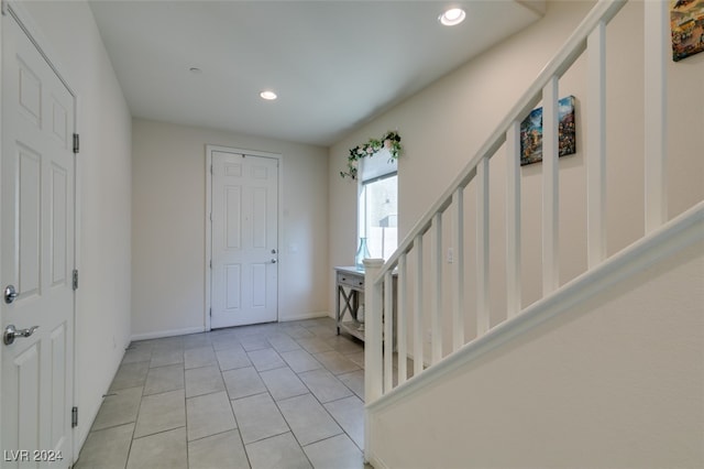 entrance foyer with light tile patterned flooring