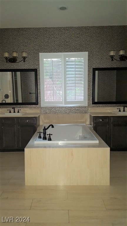 bathroom featuring vanity and a bathing tub