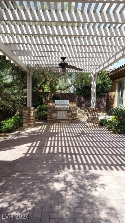 view of patio / terrace featuring a pergola, area for grilling, and ceiling fan